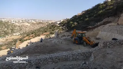  7 تملك قطعة أرض مميزه اطلالة جميلة في اجمل مناطق دورا مكلة على الخليل