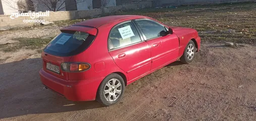  4 سيارة دايو لانوس هاتشباك موديل 2001