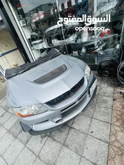  3 Mitsubishi Lancer Evolution 9  وارد اليابان ممشى قليل بحالة ممتازه متوفره كامله