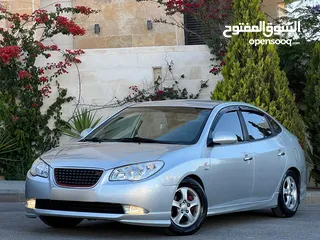  2 هونداي افانتي hd  2009 لون سلفر متاليك جير عادي بحال ممتازة للبيع