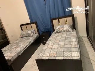  3 شارع الجامعة - شقة مفروشة ارضي غرفتين شامل المياه والإنترنت للإيجار من المالك مباشرة