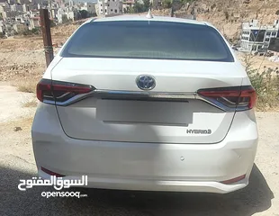  6 تويوتا كورولا 2021 هايبرد  للبيع مواصفات أوروبية سبعة جيد