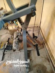  1 جهاز power tec أمريكي اصلي مع حامله أوزان 8 أذرع مع أوزان 180k مع شفتات ستيل متنوعه كبيره صغيره