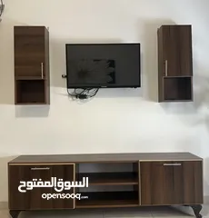  1 خزانة تلفزيون متعدد الإستخدامات باللون البني