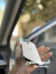  2 ايفون 14 برو ماكس 256 جيجا بطارية 87 الجهاز مغير شاشة اصلية عن تلفون تاني  بصمة وجه شغالة مية بالمية