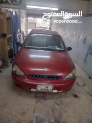  1 كيا ريو توماتيك موديل 2000