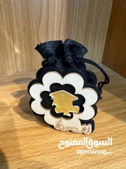  18 علب تخرج شكلاتة وحلويات باشكال وانواع مختلفه