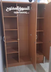  3 3 door wooden cupboard