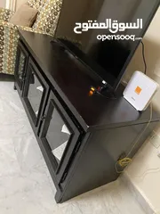  1 بوفيه تلفزيون ماركه آشلي الامريكيه وطاوله وسط