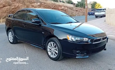  30 متسوبيشي لانسر فراشة موديل 2015 فحص مرفق مع الصور بحالة الوكاااااالة  ماشية 49 الف km  أصلي