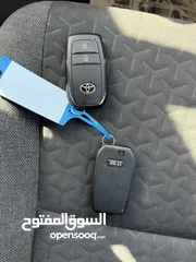  25 تويوتا ياريس كروس ترخيص 2022  محرك 1500 هايبرد  جير أوتوماتيك  172 حصان هاندبريك كهربائي عداد 61000