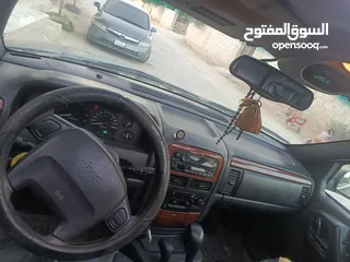  2 مواصفات جيب شروكي 1999