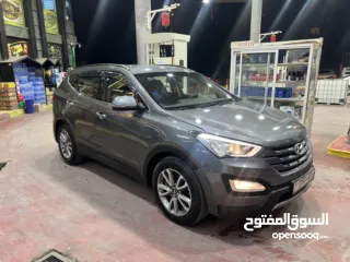  4 هونداي سنتافيه 2015 مطور 2000 ديزل اتوماتيك فل الفل بدون فتحه بسعررررر 66000 الف بسعرررر حرررق