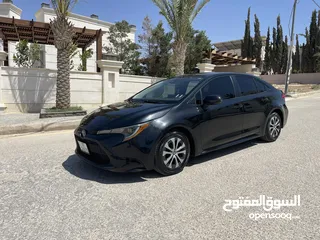  2 تويوتا كورولا 2020 هايبرد لون اسود حره باسم المستورد