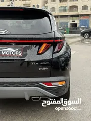  16 هونداي توسان ترخيص 2022 محرك 1600 هايبرد plug in/يقطع على الشحنه 65 كيلو متر  جير أوتوماتيك