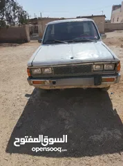  1 داتسون نيسان غماره بكم موديل 1985