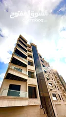  1 طابق شبه ارضي مطلة و مشمسة و مهوية بأرقى مناطق حي الياسمين المطله على كوريدور عبدون بسعر ناري جدآ