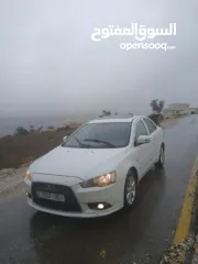  2 ميتسوبيشي لانسر. 2015 اصل برايفت   رخصة وتامين  ماطور 1600 اتومات  شامل  فتحة