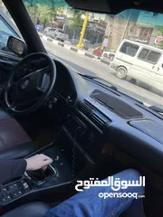  10 E34 BMW   اسود 6 سلندر