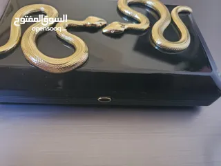  3 حقيبة كلاتش من ماركة كيليان ذا تمبتريس سوداء وراقيه ،Black Clutch The Temptress by Kilian