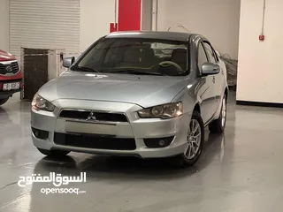  3 ميتسوبيشي لانسر 2016 كرت ابيض
