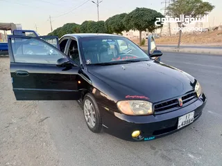  12 كيا سبكترى 2001للبيع المستعجل تومتك 2جيد خلفي ودقات امامي ماتور جديد دهان جديد ترخيص جديد مكينك جديد