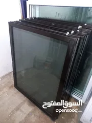  7 شبابيك المنيوم لون برونز زجاج برونز متوفر عدة مقاسات  بحال الوكاله