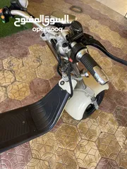  14 ‏دراجة كهربائية electric scooter