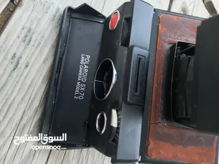  28 polarid sx70 & OLYMPUS & KODAK DISC