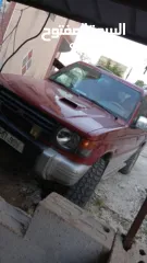  3 ميتسوبيشي باجيو1999  جير اتوماتيك 7 ركاب غرفه جلد عسليه  جير ومطور جاد مركبات