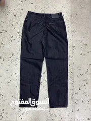  2 بنطلون Harley Davidson  size 32/34 شامل توصيل البنطلون قديم سعرو على المواقع الثانيه اغلى