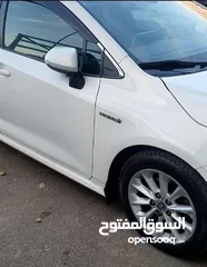  9 تويوتا كورولا 2021 هايبرد  للبيع مواصفات أوروبية سبعة جيد