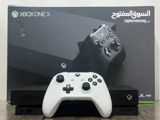  1 جهاز Xbox One X بحالة الجديد مع كرتونته