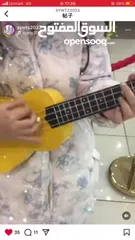  4 Ukulele small guitar good gift يوكاليل جيتار صغير هدية جيدة للأطفال أو الأصدقاء.