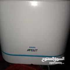  4 جهاز تعقيم رضعات اطفال وحافظ الحليب