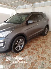  10 هونداي سنتافي 3.3L ( 4WD ) موديل 2015 بدون حوادث صبغة الوكاله