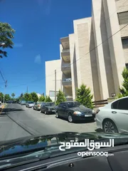  11 شقة ارضية للبيع الدوار الرابع خلف رئاسة الوزراء معفاه من الرسوم