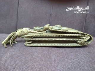  7 نوادر..حقيبة من جلد صغير تنين الكومودو