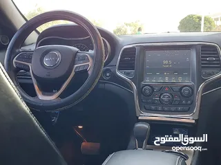  22 جيب جراند شيروكي فل الفل اعلى فئة بانوراما 2014 فحص كامل لون فيراني مميز بسعر مغري قابل للبدل والاقص