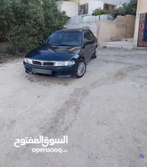  4 السلام عليكم سيارة ميتسوبيشي لانسر موديل 1996 محولة كامل 2000 السيارة على حبة بلادها مش ملعوب فيها
