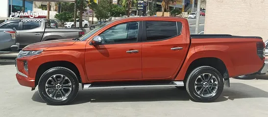  3 ميتسوبيشي سبيرتيرو L200 2021  فحص كامل (3/كاميرات) يمكن التمويل عن طريق المعرض بدفعه أولى 11000 الف