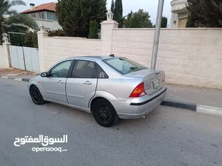  1 فورد فوكس 2006 اتماتك لعبه السياره بسعر حرق 18000 ألف نقدا جير ماتور نايلون ورق