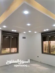  4 شقه 205م طابق ثاني فني للبيع على شارع البترا شرق كازيه الرجوب واربد مول قراند