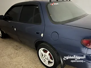  4 كيا سيفيا لون ازرق ميتالك نظيفه مع جنط 15 مميز كاوشوك وكاله غرفه نطيفه بطاريه جديده لسى كفالتها معها