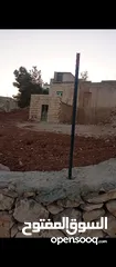  5 للبيع ارض 800 متر في الشواورة مع منزل صغير