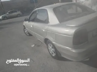  1 سوزوكي بالينو 1998