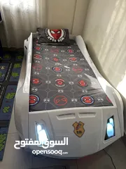  1 سرير اطفال بدون مقابل  ( سيارة مع اضاءة وصوت )