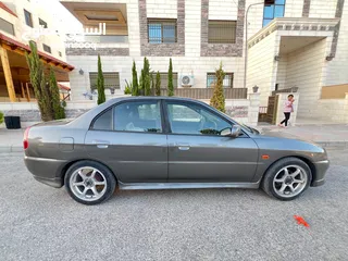  7 متسوبيشي لانسر موديل 1999 بحاله الوكاله