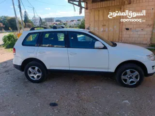  8 فولكس فاجن طوارق 2008 بحالة الوكالة  ماتور ديزل 3000 V6 عداد 145000 جير و ماتور و شصيات 100% وعلى ال