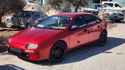 2 مازدا 323F